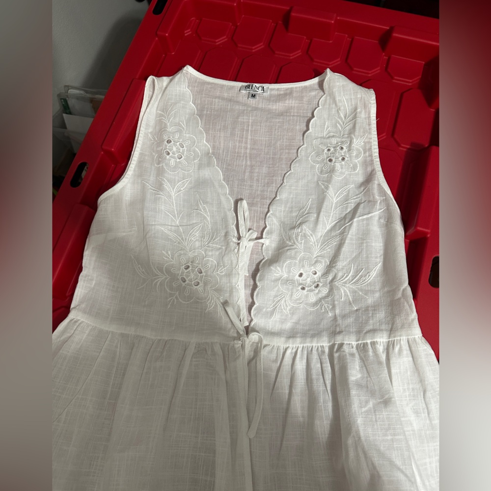 Sleeveless White Floral Blouse